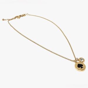 Kate Spade Gold Necklace with Black and Crystal Charms